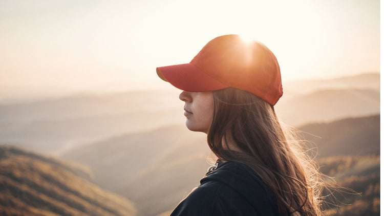 Gorras y complementos personalizados con huella de carbono calculada para empresas